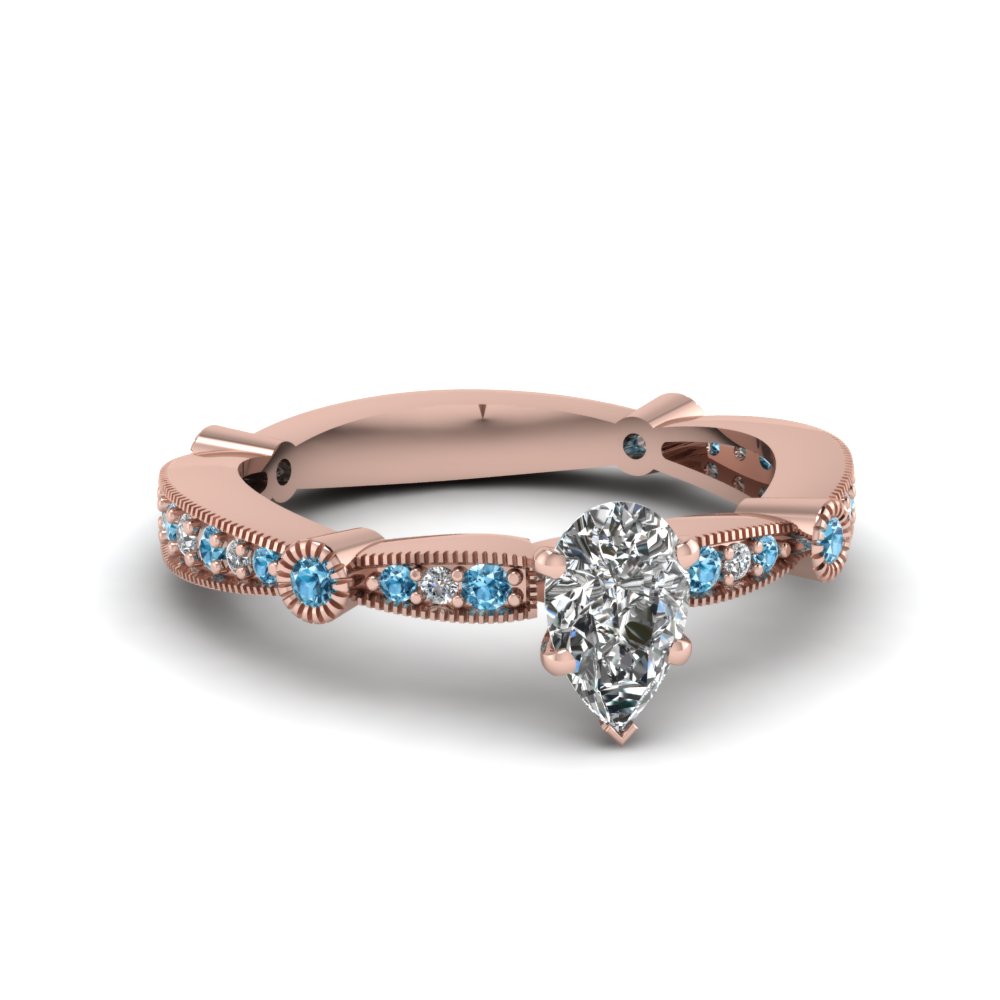 Pear Diamond And Blue Topaz Milgrain Proposal Ring